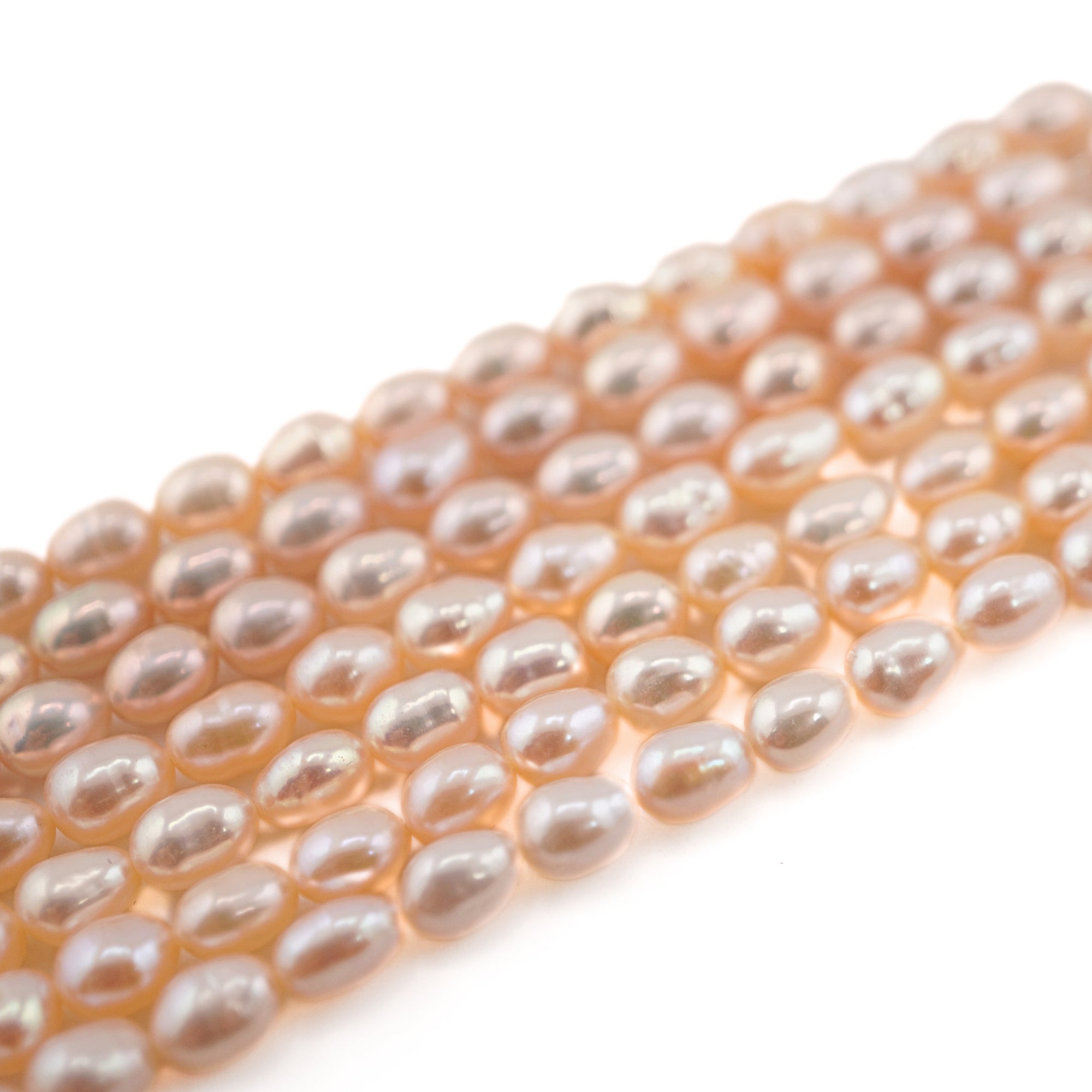 Wholesale oval pearl beads


