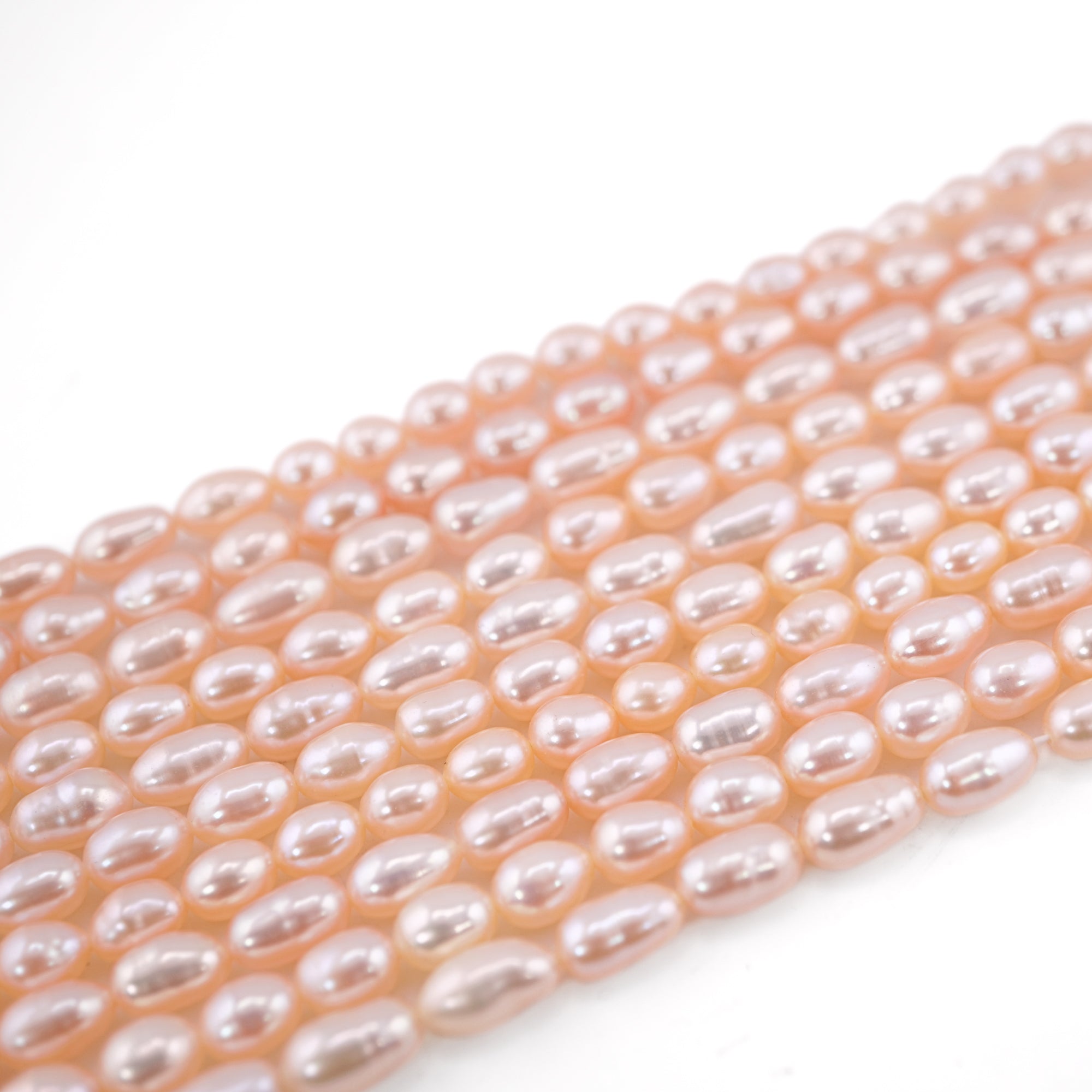 Wholesale peach oval pearl beads

