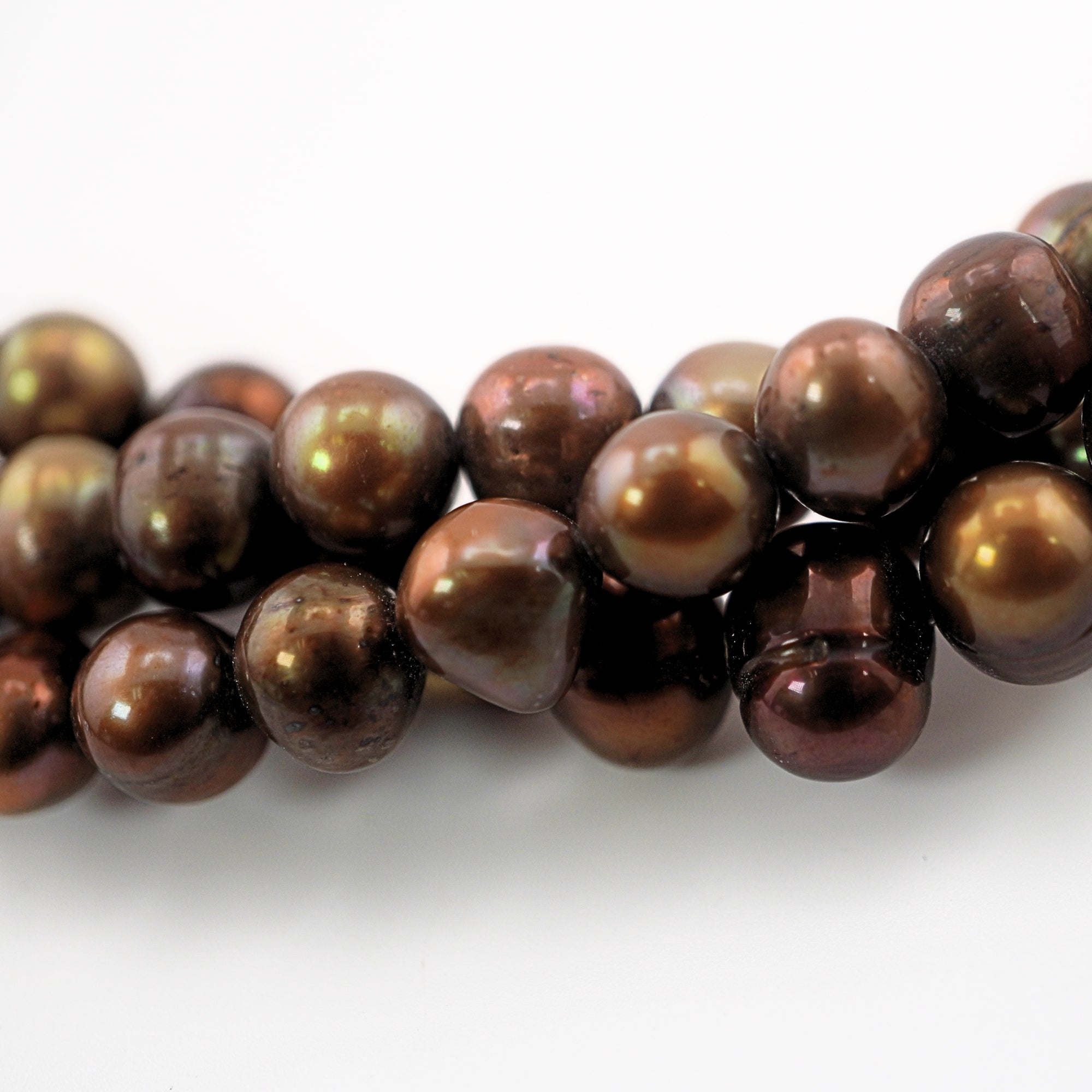 Wholesale peacock tone beads – chocolate pearls

