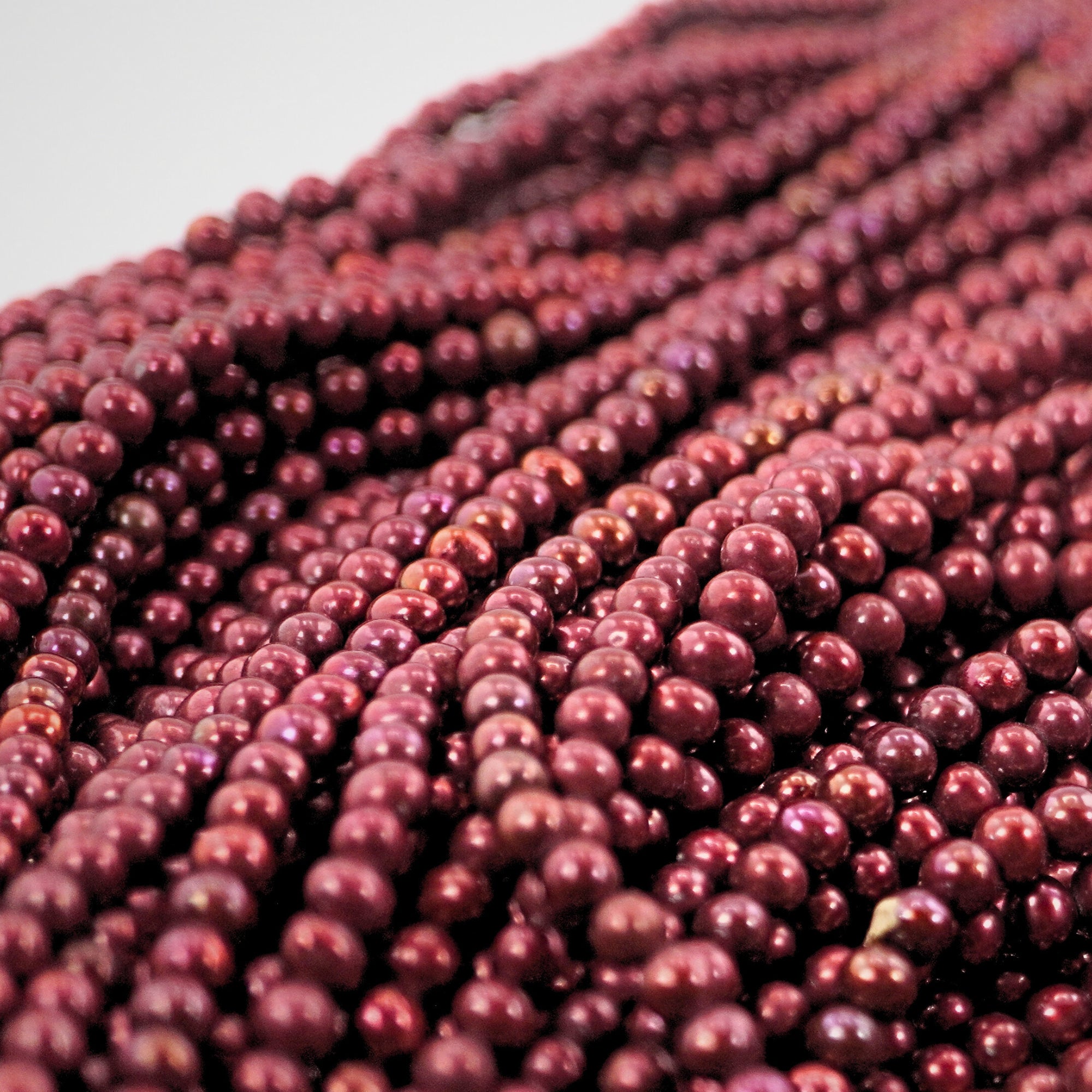 cherry red pearl beads close-up

