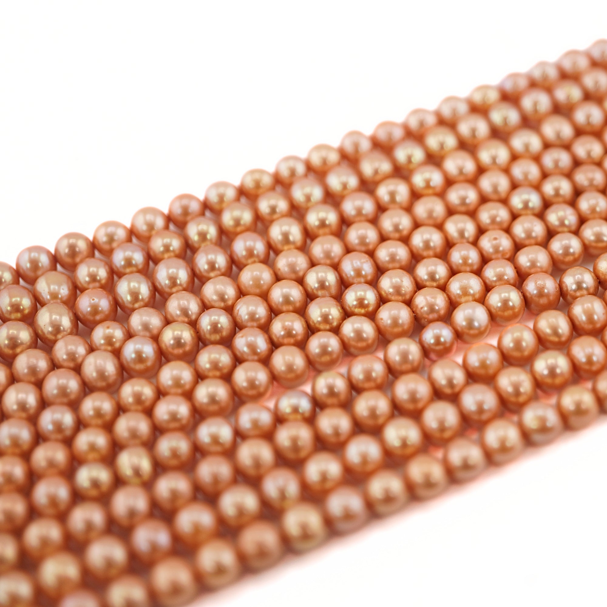 handcrafted golden pearl strands

