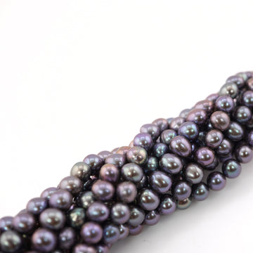 handcrafted peacock pearl strands

