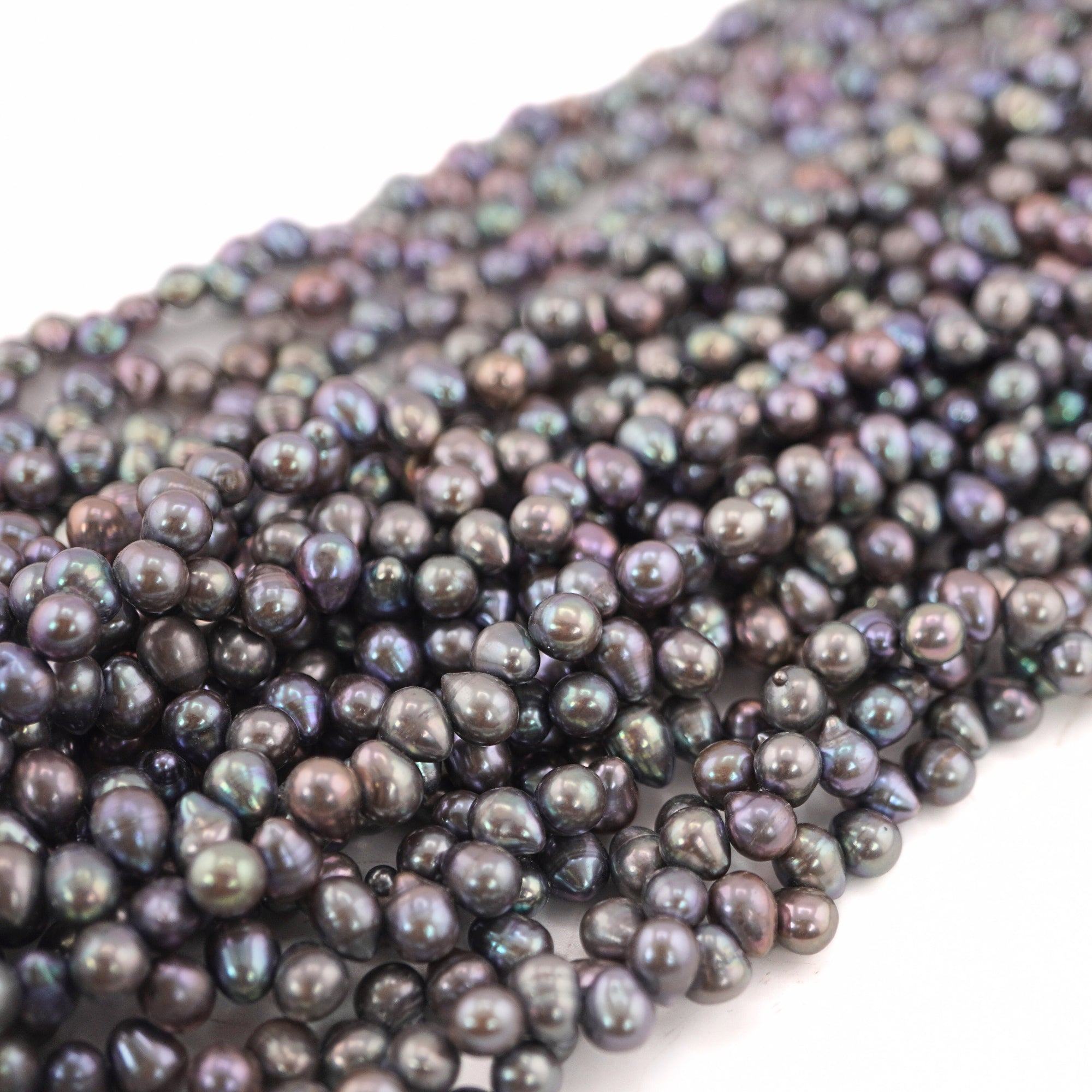 jewelry making pearls in peacock hue

