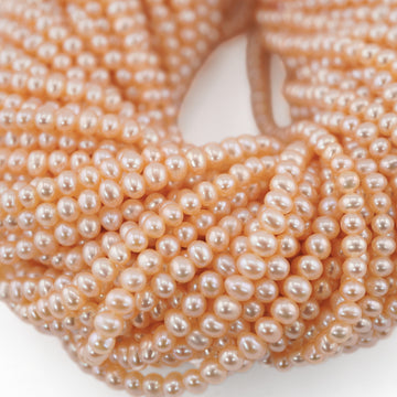 peach near round freshwater pearls

