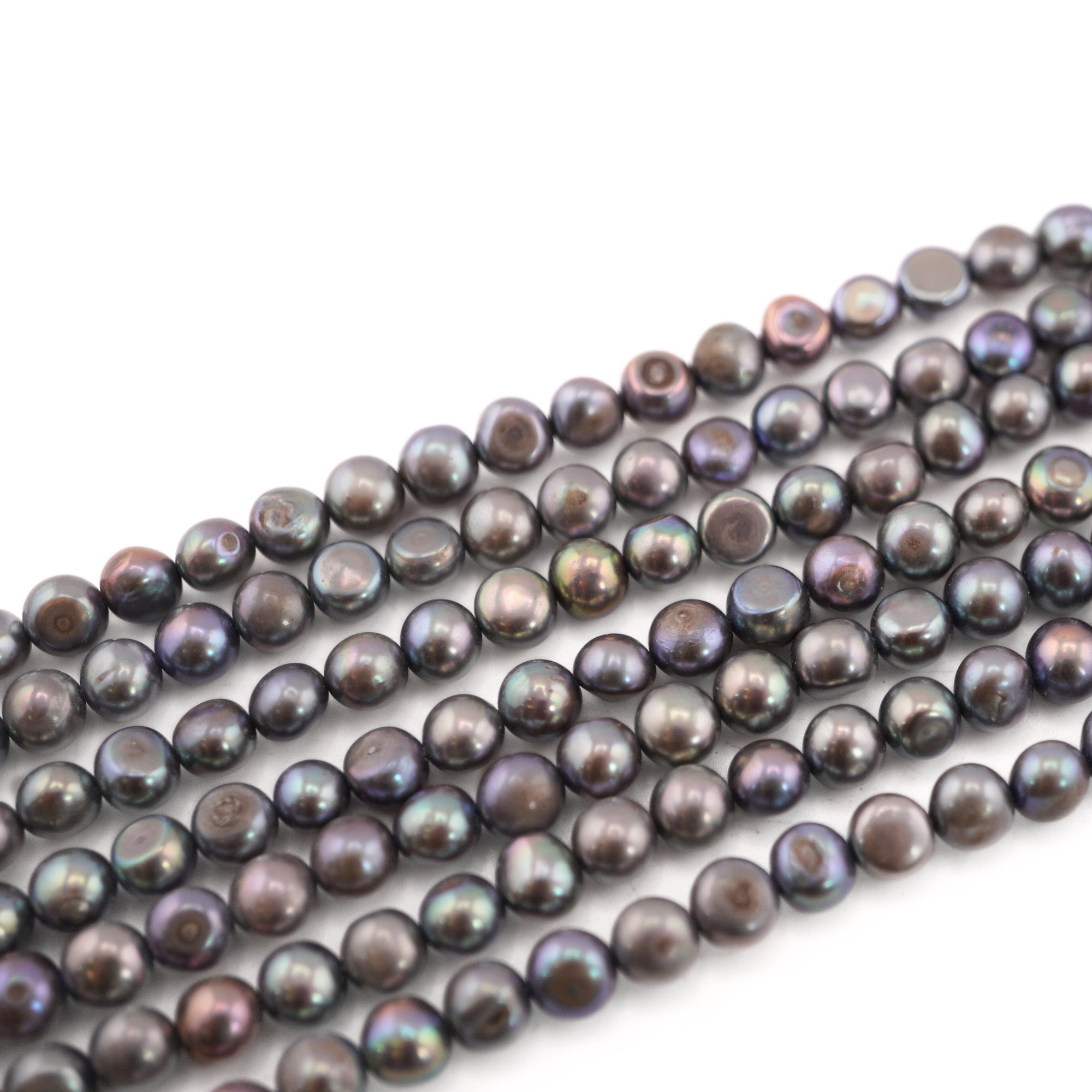 peacock near round freshwater pearls

