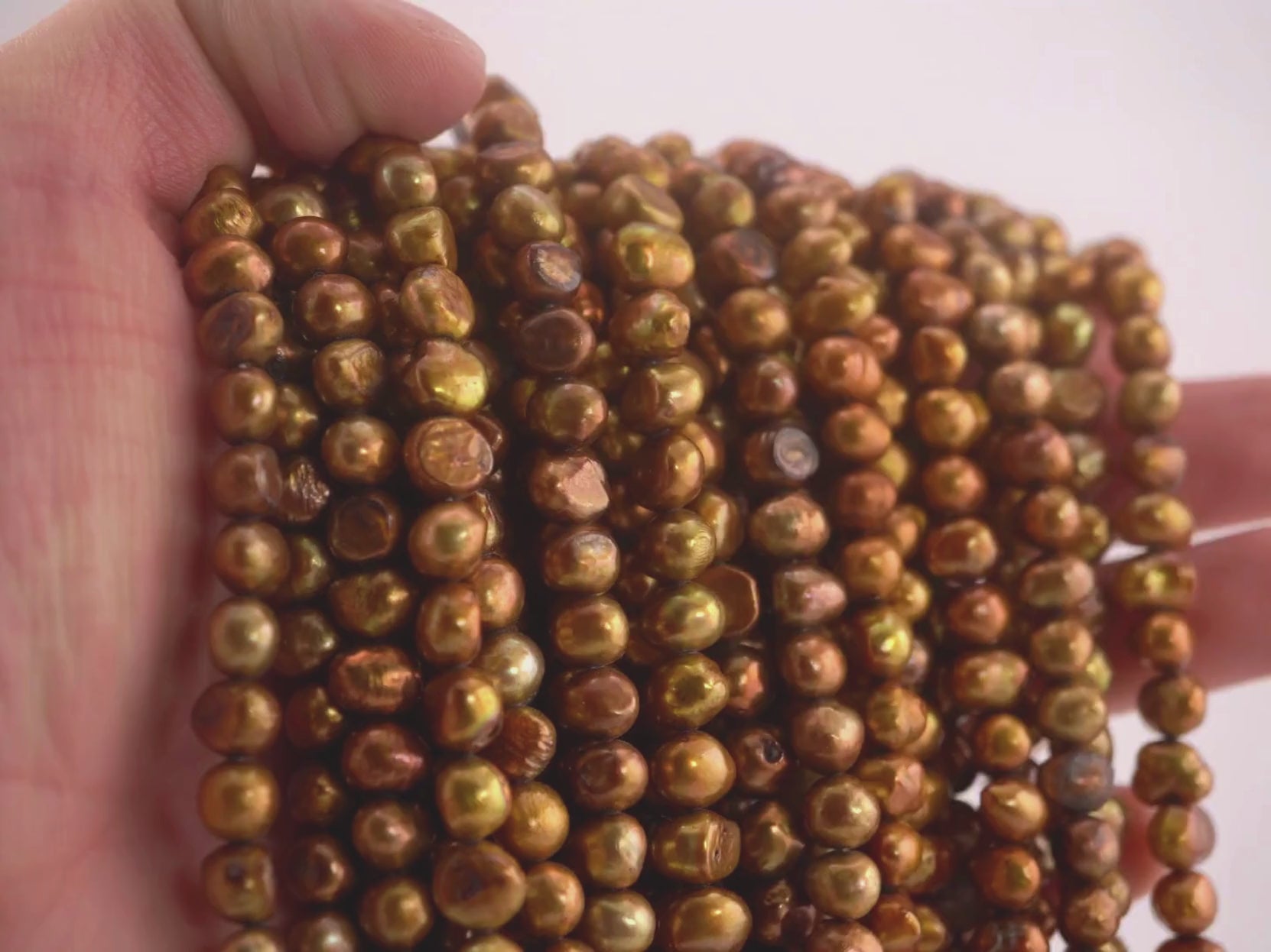 Bulk potato pearls golden finish

