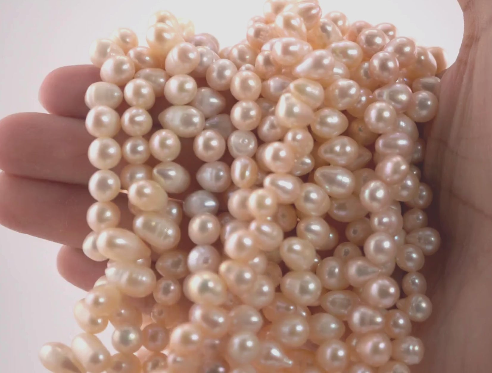 Buy peach freshwater pearl strand

