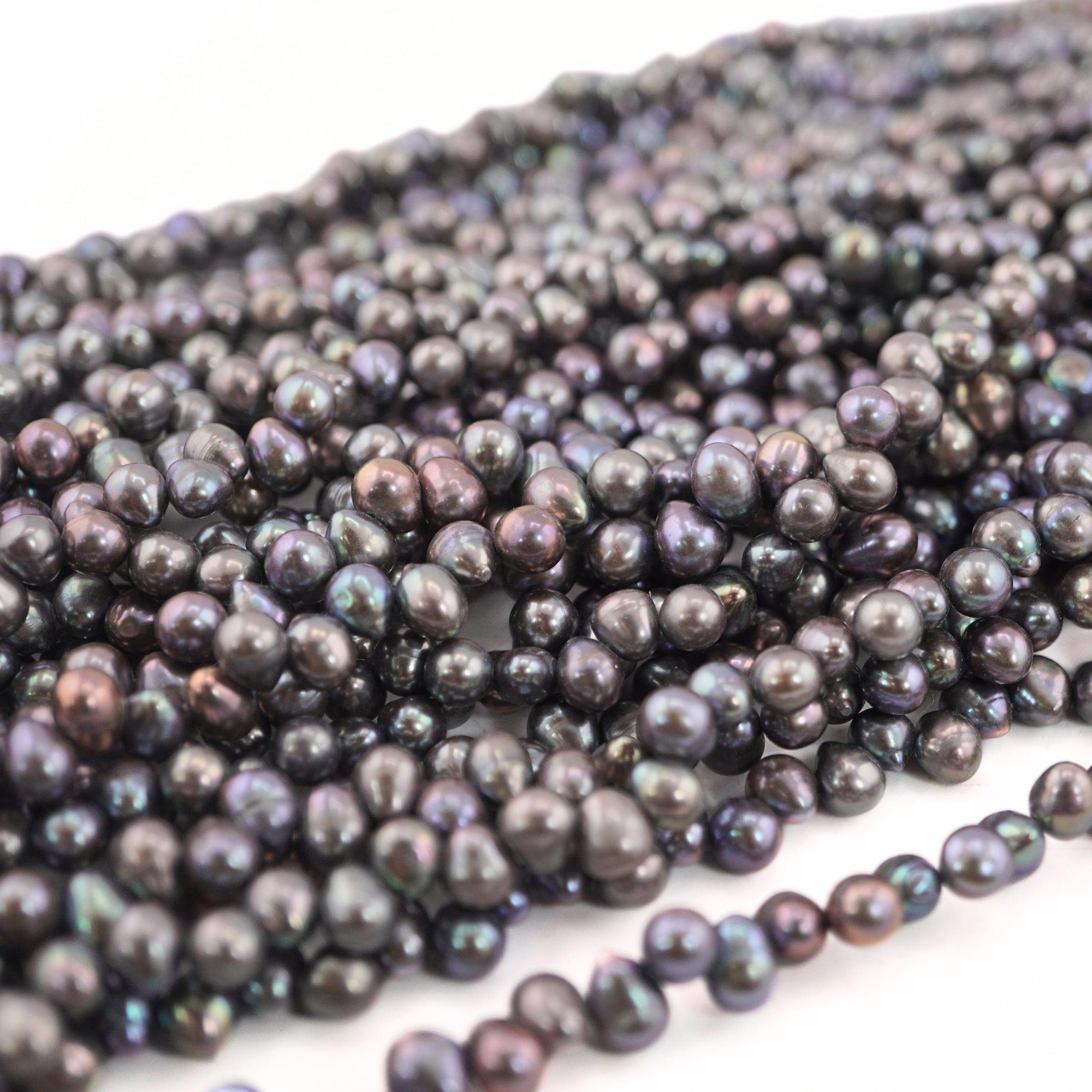 wholesale peacock pearl beads

