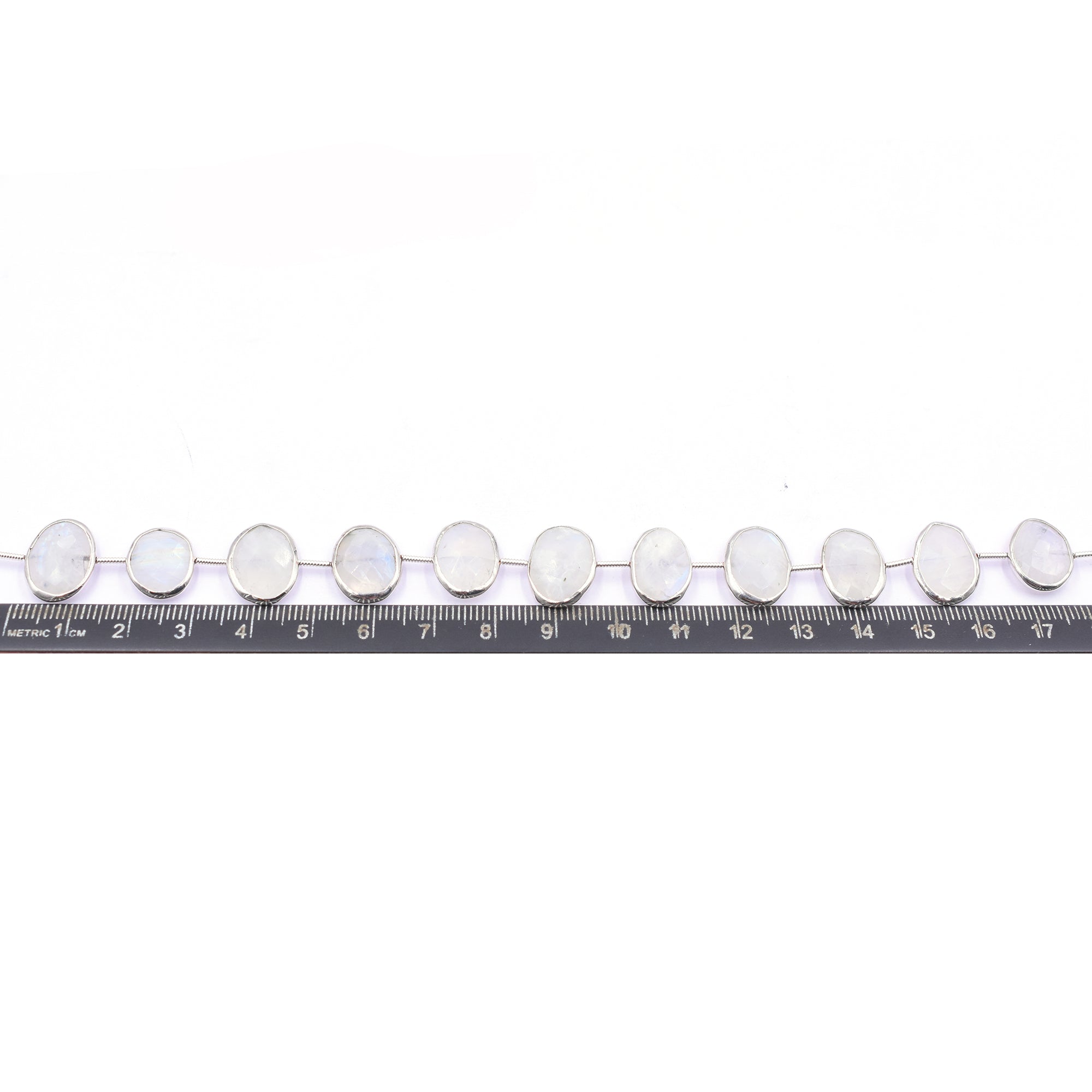 Rainbow Moonstone 15X11 MM Oval Shape Silver Bezel Rhodium Plated Center Drilled Strand - Jaipur Gem Factory