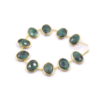 Raw emerald oval shape silver bezel strand