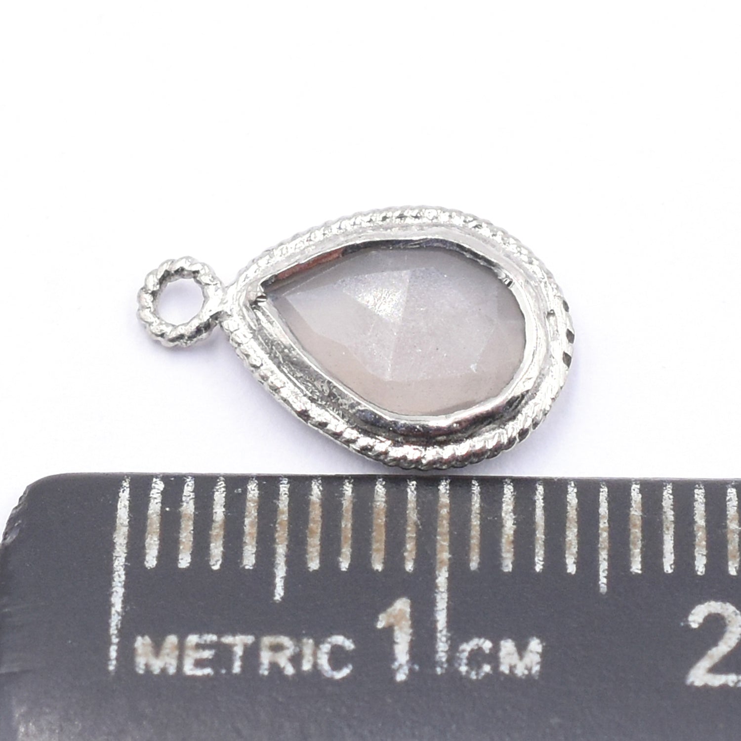 Gray Moonstone 9X7 MM Pear Shape Twisted Wire Silver Bezel Rhodium Plated Pendant (Set Of 2 Pcs) - Jaipur Gem Factory