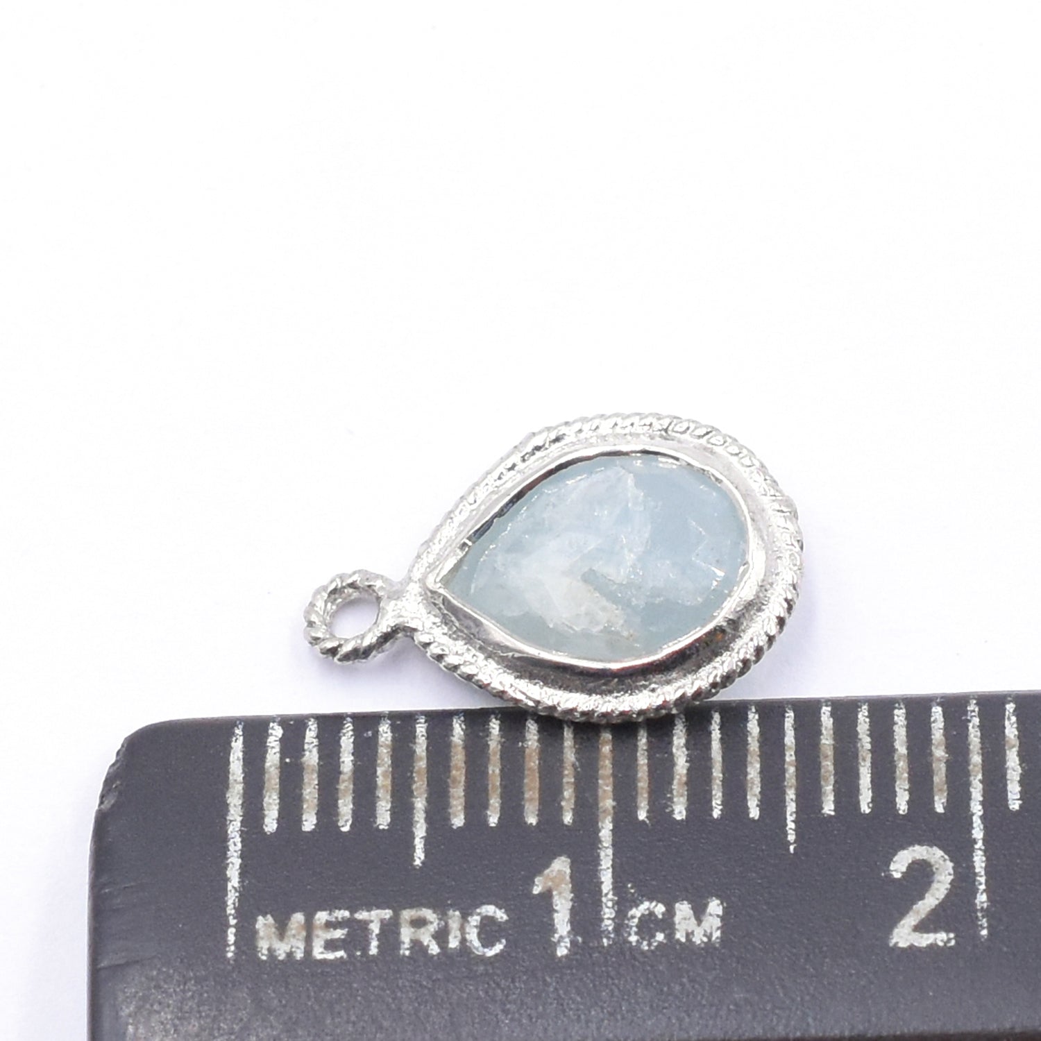 Aquamarine 9X7 MM Pear Shape Twisted Wire Silver Bezel Rhodium Plated Pendant (Set Of 2 Pcs) - Jaipur Gem Factory