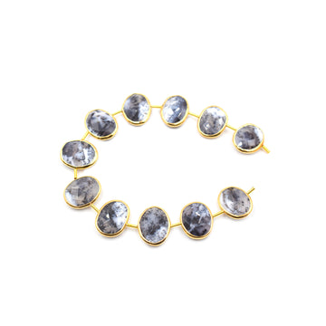 Dendritic opal oval strand
