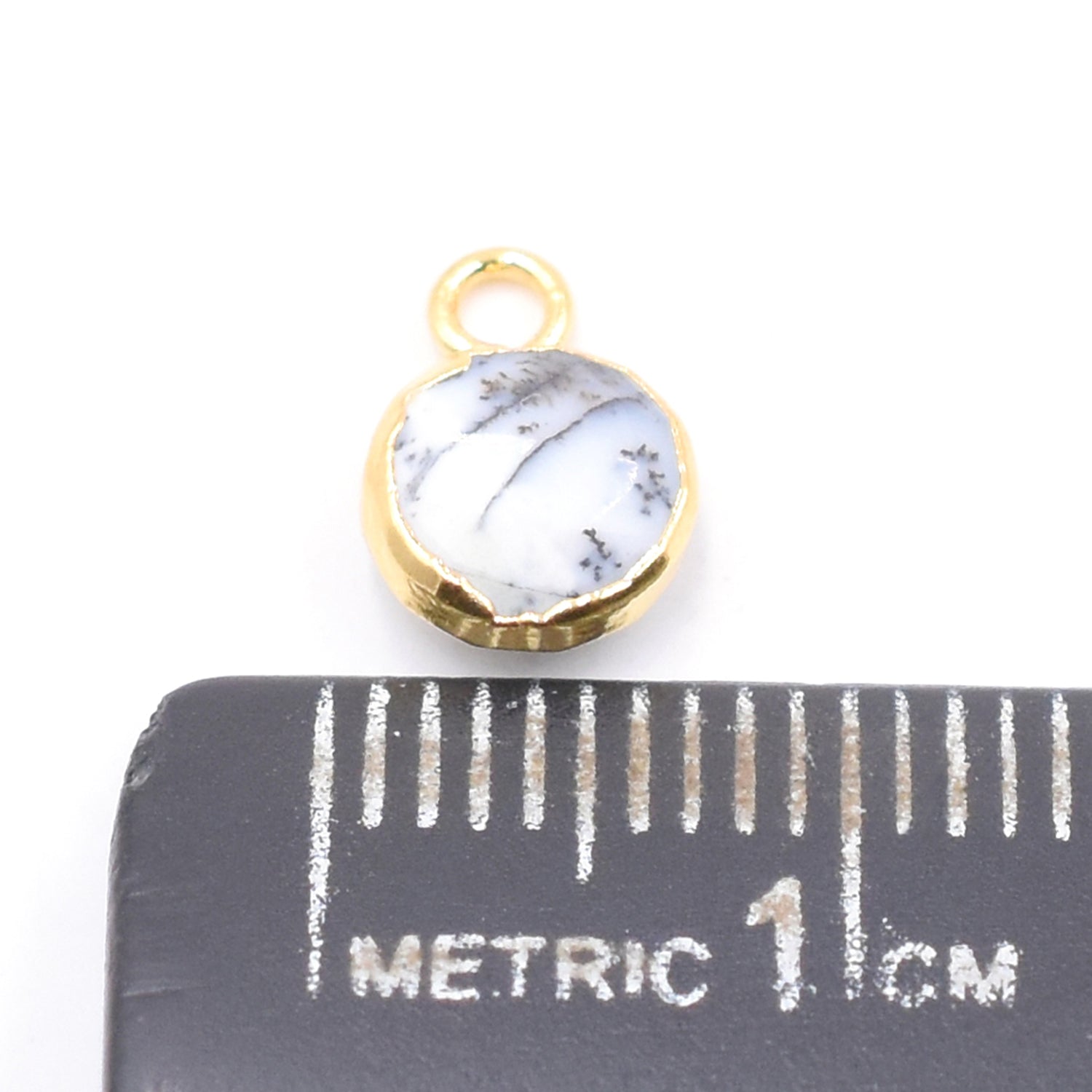 Dendritic Opal round pendant in gold frame
