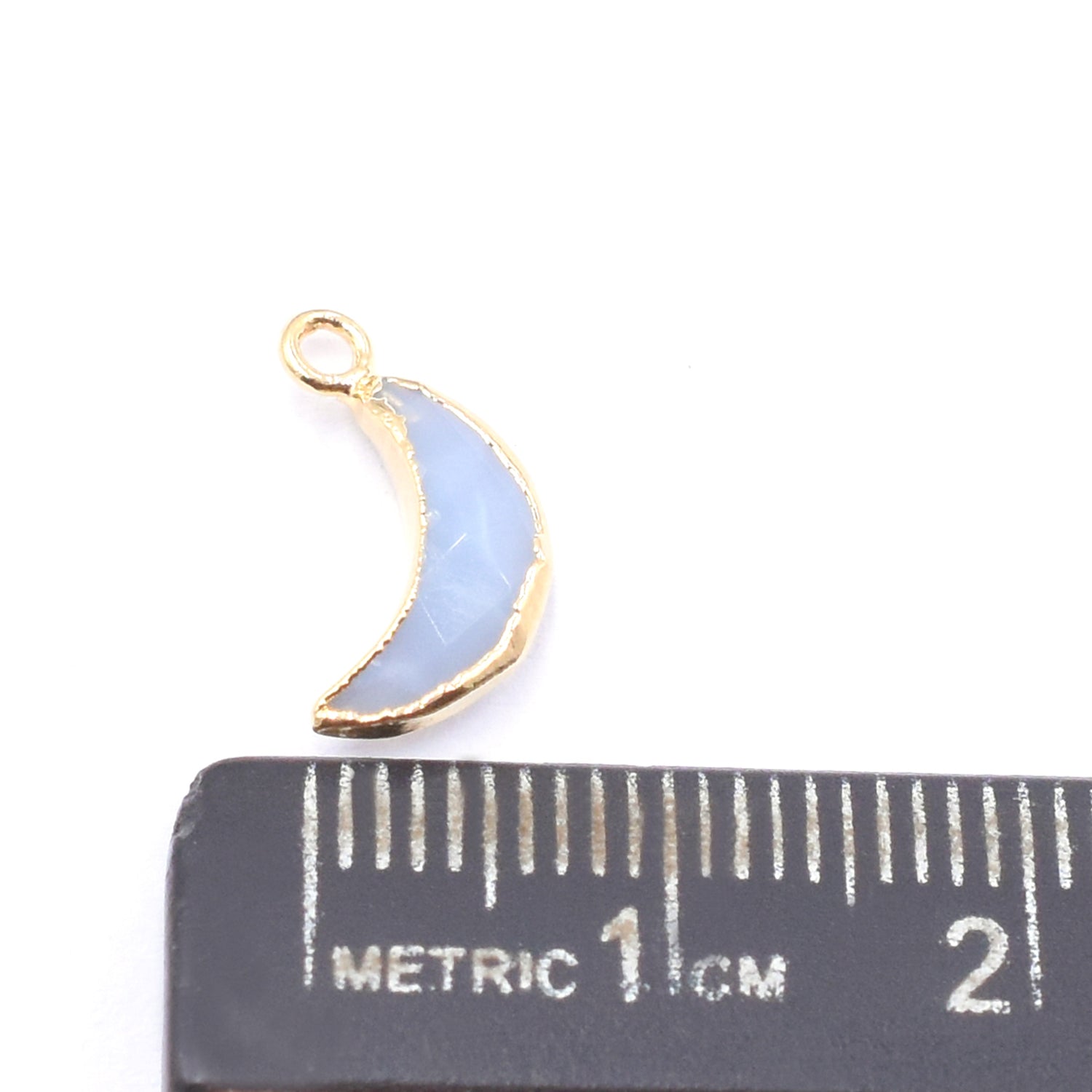 Unique Blue Opal moon shaped pendant with gold detailing