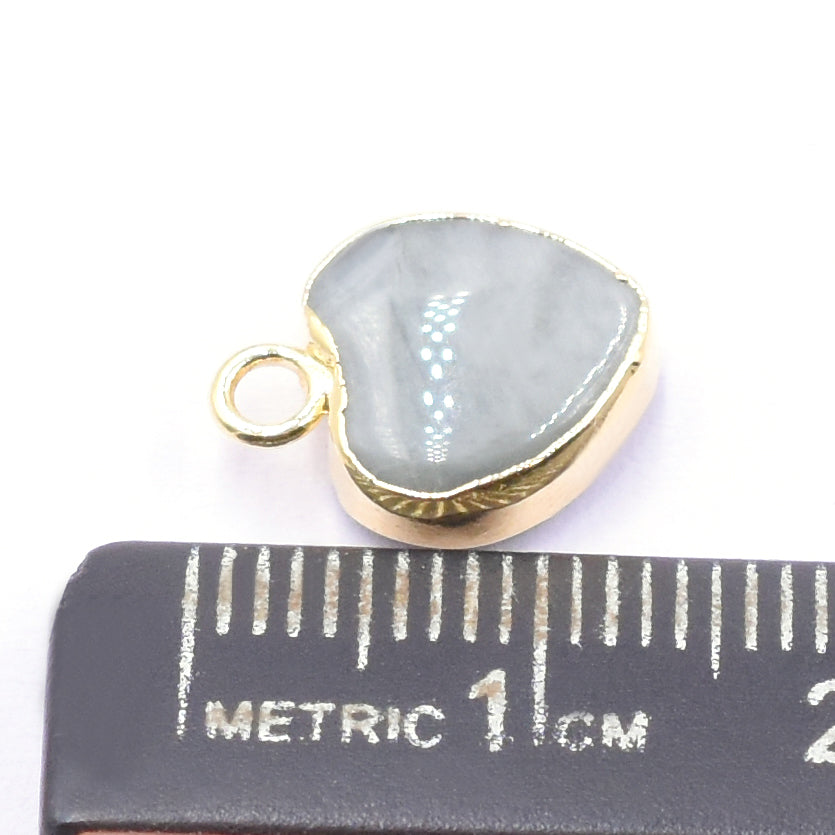 Charming Cat's Eye heart-shaped pendant with gold detailing