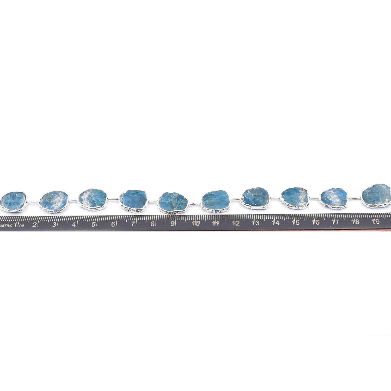 Neon Blue Apatite 15X12 MM Uneven Shape Straight Drilled Rhodium Electroplated Strand - Jaipur Gem Factory