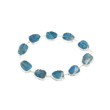 Uneven shaped Blue Apatite pendant with gold electroplated finish