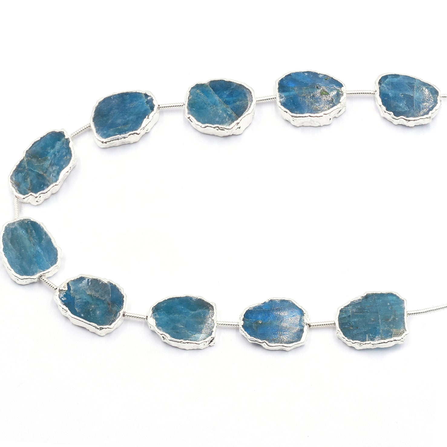 Neon Blue Apatite 15X12 MM Uneven Shape Straight Drilled Rhodium Electroplated Strand - Jaipur Gem Factory