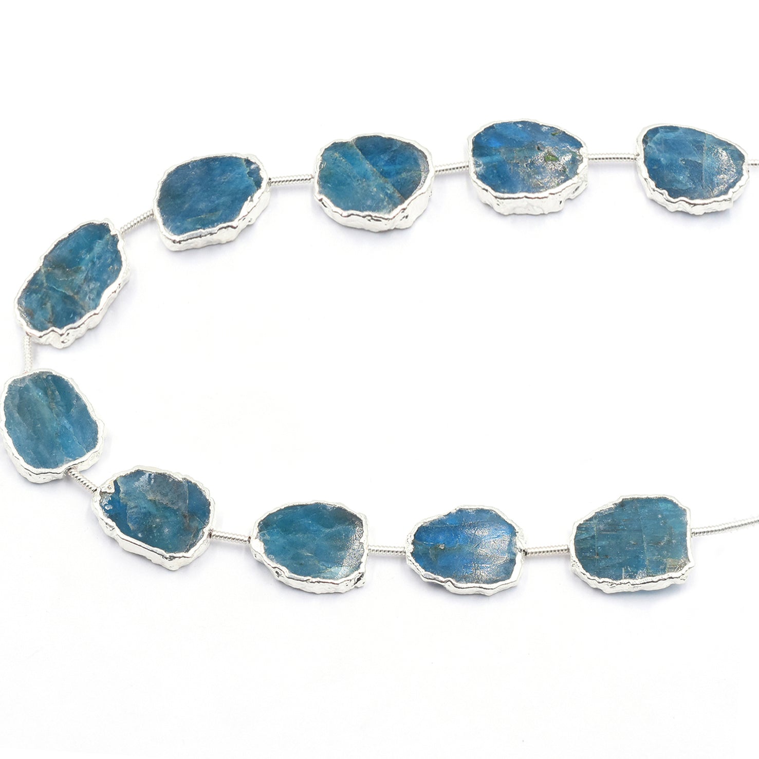 Elegant Blue Apatite Uneven pendant in gold frame