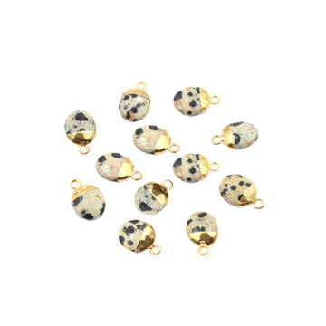 oval shaped Dalmatian Jasper pendant with gold finish