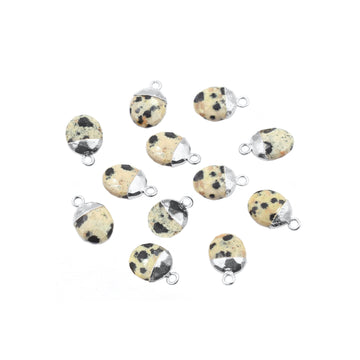 oval shaped Dalmatian Jasper pendant with silver finish