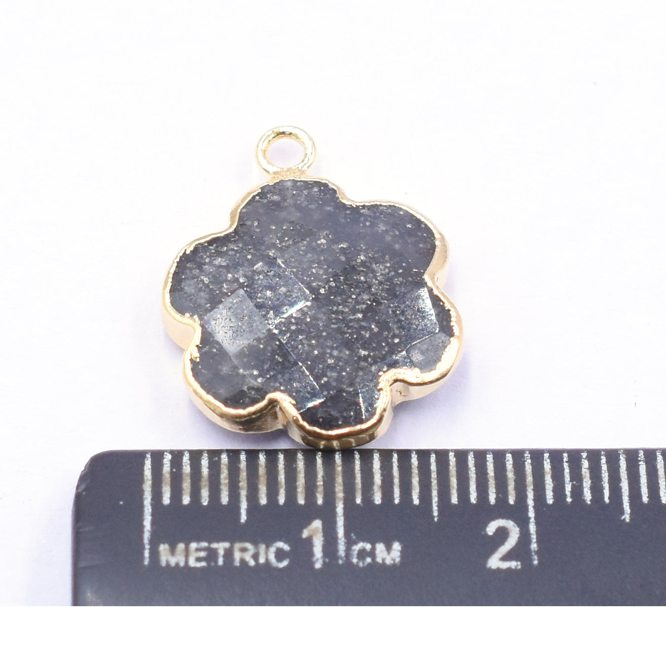 Black Sunstone 13 To 15 MM Clover Leaf Shape Gold Electroplated Pendant