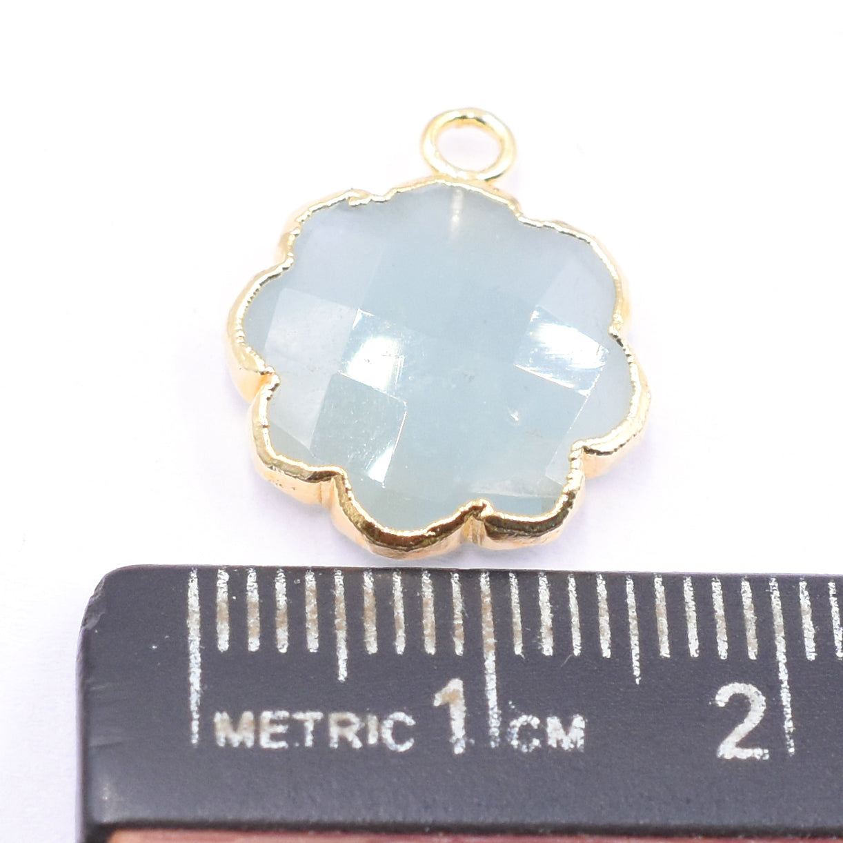 Stylish aquamarine Leaf pendant in gold finish